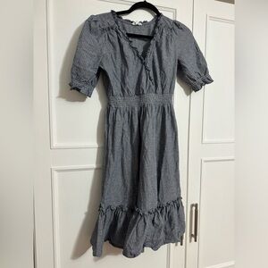 A loves a sundress. Grey/blue with light grey pinstripe